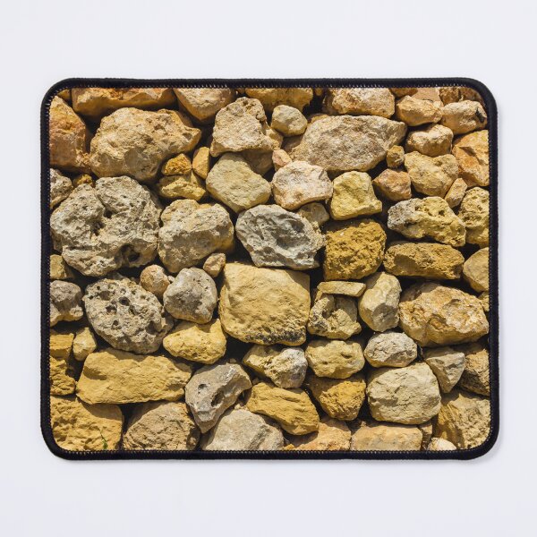 Item preview, Sunlit Dry Stone Wall of Rough Limestone Rocks Showing Texture and Rustic Mediterranean Character designed and sold by Nmallia.