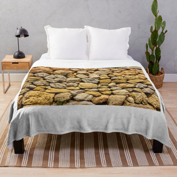 Item preview, Sunlit Dry Stone Wall of Rough Limestone Rocks Showing Texture and Rustic Mediterranean Character designed and sold by Nmallia.