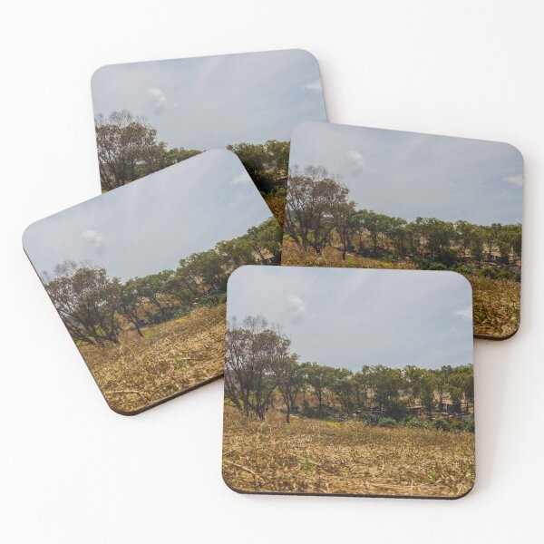 Item preview, Dry Harvest Field With Tree Line and Terraced Hillside Landscape Under Overcast Sky designed and sold by Nmallia.