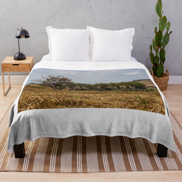 Item preview, Dry Harvest Field With Tree Line and Terraced Hillside Landscape Under Overcast Sky designed and sold by Nmallia.