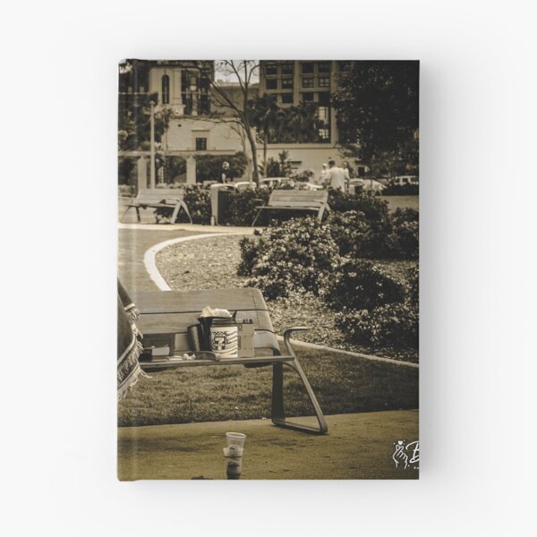 Item preview, A person with their personal belongings in an urban park designed and sold by By Sanata Photography.
