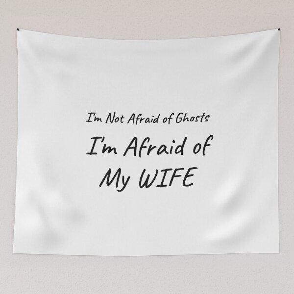 Item preview, I'm Not Afraid of Ghosts I'm Afraid of My Wife Funny Halloween Tee designed and sold by low battery meme design.