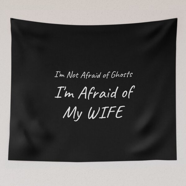Item preview, I'm Not Afraid of Ghosts I'm Afraid of My Wife Funny Halloween Tee designed and sold by low battery meme design.