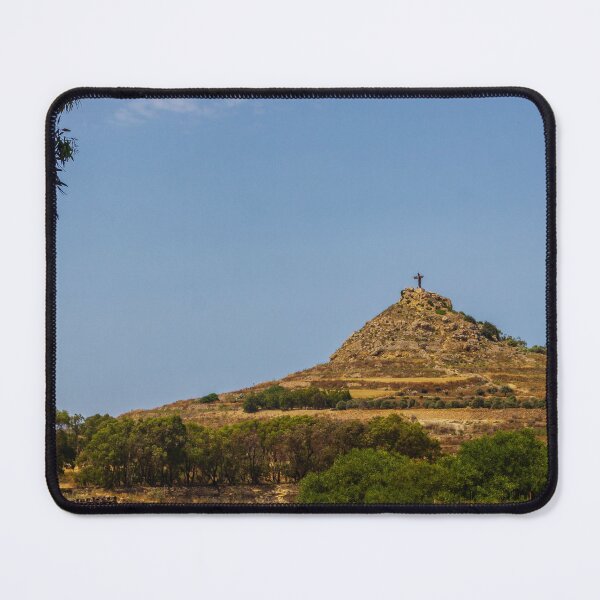 Item preview, Hilltop Cross On Rocky Mound Overlooking Rural Landscape Under Clear Blue Sky designed and sold by Nmallia.