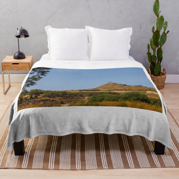 Item preview, Hilltop Cross On Rocky Mound Overlooking Rural Landscape Under Clear Blue Sky designed and sold by Nmallia.