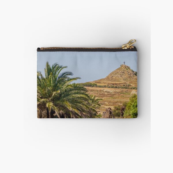 Item preview, Palm Trees Framing a Rocky Hill With a Cross Monument Overlooking Arid Rural Landscape designed and sold by Nmallia.