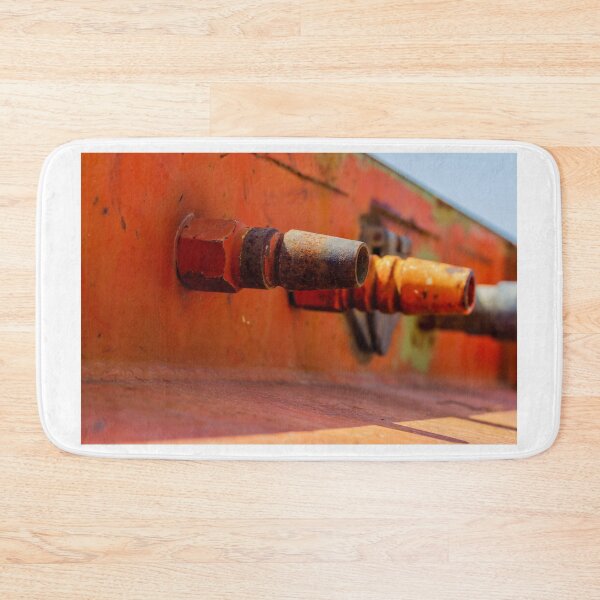 Item preview, Rusty Metal Hose Connectors Close-Up On Orange Industrial Surface With Weathered Texture designed and sold by Nmallia.