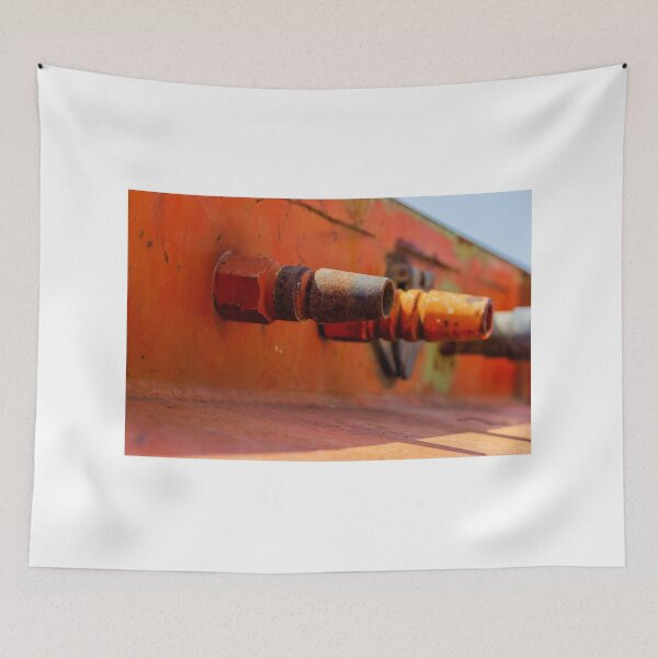 Item preview, Rusty Metal Hose Connectors Close-Up On Orange Industrial Surface With Weathered Texture designed and sold by Nmallia.