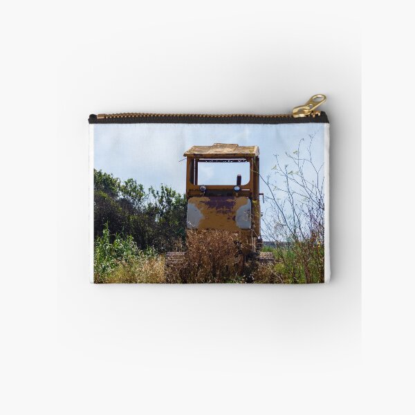 Item preview, Abandoned Yellow Bulldozer Overgrown in Field Under Blue Sky, Rusted Construction Machinery designed and sold by Nmallia.