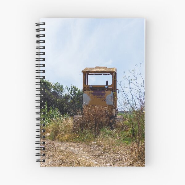Item preview, Abandoned Yellow Bulldozer Overgrown in Field Under Blue Sky, Rusted Construction Machinery designed and sold by Nmallia.