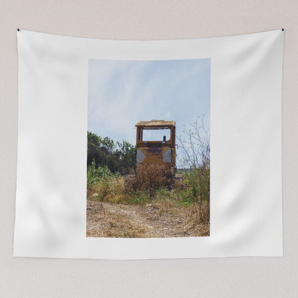 Item preview, Abandoned Yellow Bulldozer Overgrown in Field Under Blue Sky, Rusted Construction Machinery designed and sold by Nmallia.