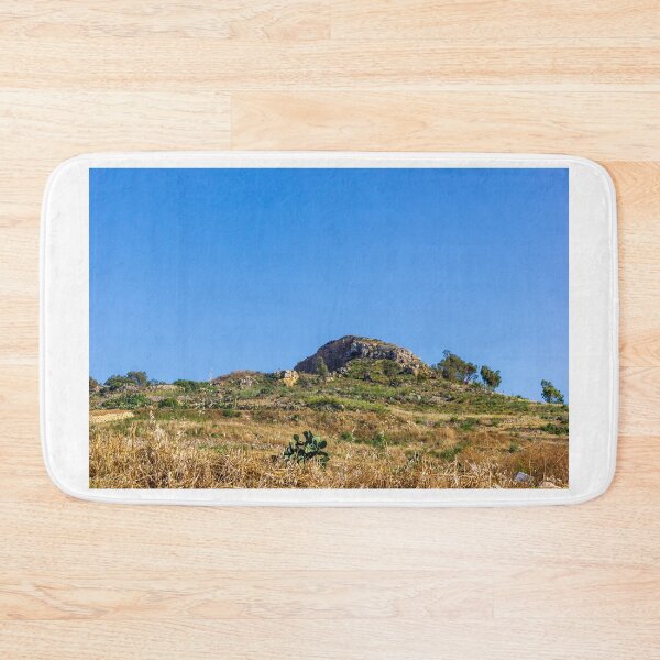 Item preview, Sunny Mediterranean Hill Landscape With Rocky Outcrop, Terraced Countryside And Dry Grass Under Blue Sky designed and sold by Nmallia.