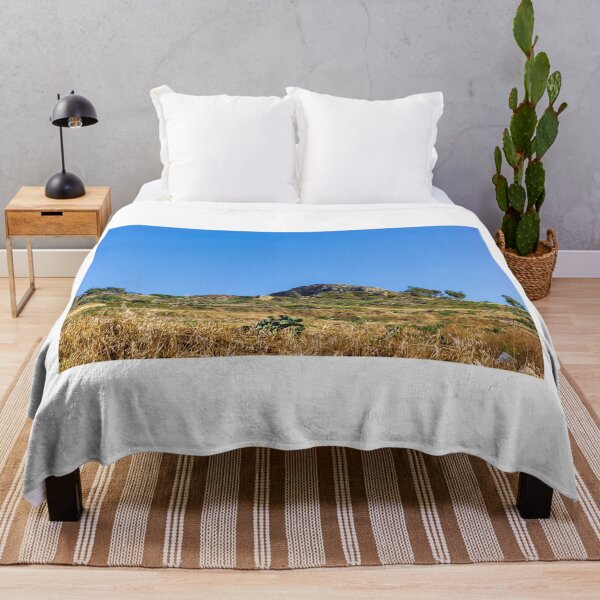 Item preview, Sunny Mediterranean Hill Landscape With Rocky Outcrop, Terraced Countryside And Dry Grass Under Blue Sky designed and sold by Nmallia.