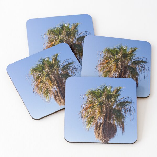 Item preview, Tall Palm Tree With Dry Fronds Against Clear Blue Sky On A Sunny Day designed and sold by Nmallia.