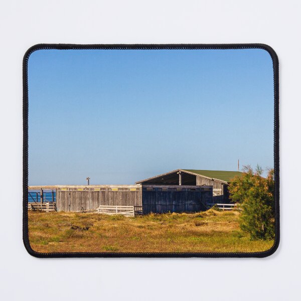 Item preview, Weathered Wooden Beach Shack by Coastal Grassland Under Clear Blue Sky and Ocean Horizon designed and sold by Nmallia.
