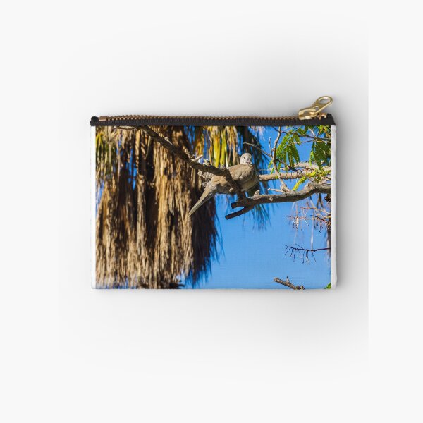 Item preview, Dove Pair Perched on Sunlit Tree Branches against a Clear Blue Sky designed and sold by Nmallia.