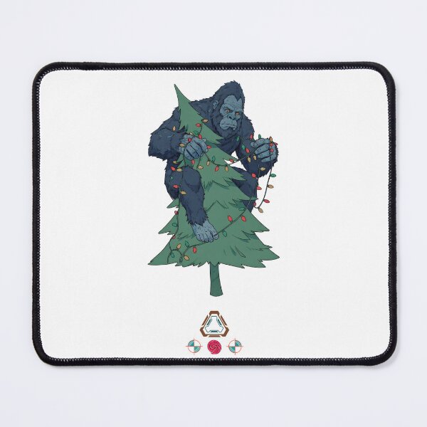 Item preview, Bigfoot Decorating the Christmas Tree - Funny Sasquatch Holiday T-Shirt designed and sold by Whimsy Trail Co.