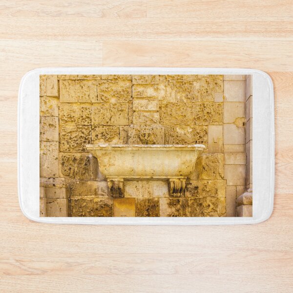 Item preview, Weathered Stone Wall Fountain With Carved Basin and Historic Masonry Detail in Mediterranean Courtyard designed and sold by Nmallia.