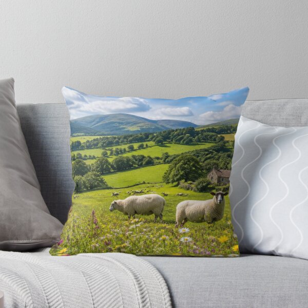 Item preview, Sheep Grazing In Colourful Wildflower English Countryside Landscape designed and sold by ThatSurreyLife.