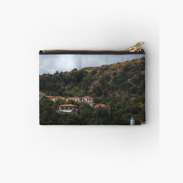 Item preview, Greek  mountain village under cloudy sky designed and sold by MMLK9394.