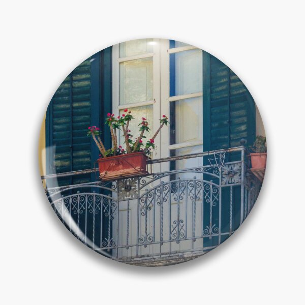 Item preview, Ornate Mediterranean Balcony With Wrought-Iron Railing, Blue Shutters and Potted Flowers on Historic Facade designed and sold by Nmallia.