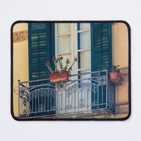 Item preview, Ornate Mediterranean Balcony With Wrought-Iron Railing, Blue Shutters and Potted Flowers on Historic Facade designed and sold by Nmallia.