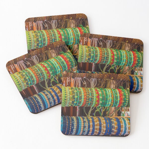 Item preview, Colorful Handmade Woven Bracelets Displayed on Wooden Rack in Artisan Market Jewelry Stall designed and sold by Nmallia.