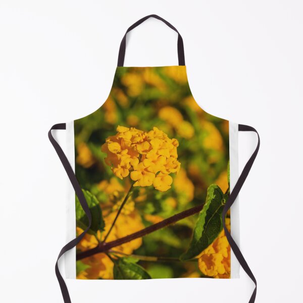 Item preview, Yellow Lantana Flower Cluster Close-Up With Green Leaves And Soft Bokeh Background designed and sold by Nmallia.