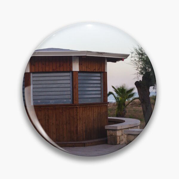 Item preview, Closed Wooden Beach Kiosk on Seafront Promenade With Palm Trees and Calm Evening Sky designed and sold by Nmallia.