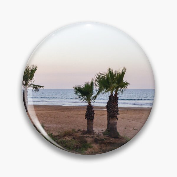 Item preview, Tranquil Beach With Palm Trees Along Sandy Shoreline at Pastel Sunrise Over Calm Sea designed and sold by Nmallia.