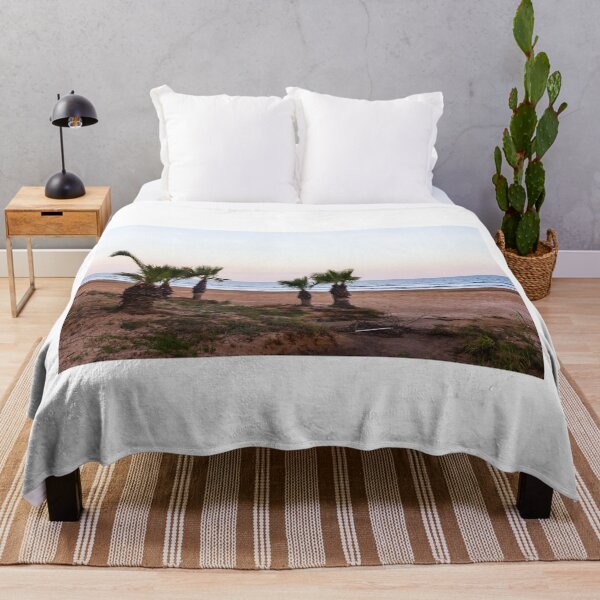 Item preview, Tranquil Beach With Palm Trees Along Sandy Shoreline at Pastel Sunrise Over Calm Sea designed and sold by Nmallia.