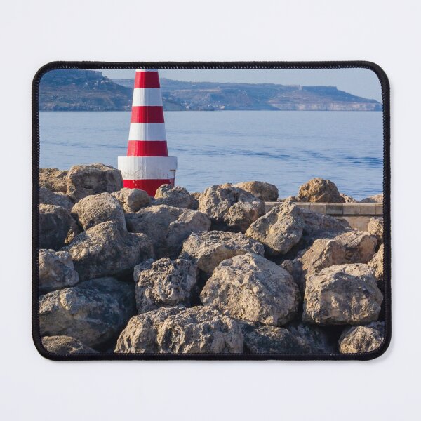 Item preview, Red and White Striped Lighthouse on Rocky Breakwater by Calm Sea with Distant Coastline designed and sold by Nmallia.