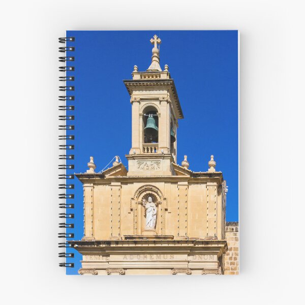 Item preview, Historic Church Bell Tower With Statue, Cross and Bronze Bells Against Clear Blue Sky designed and sold by Nmallia.