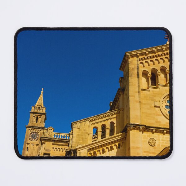 Item preview, Historic Stone Cathedral Facade With Clock Tower And Rose Window Against A Clear Blue Sky designed and sold by Nmallia.