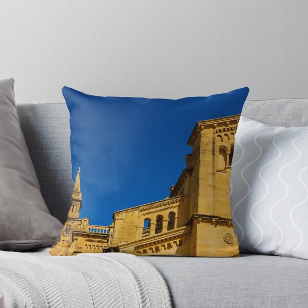 Item preview, Historic Stone Cathedral Facade With Clock Tower And Rose Window Against A Clear Blue Sky designed and sold by Nmallia.