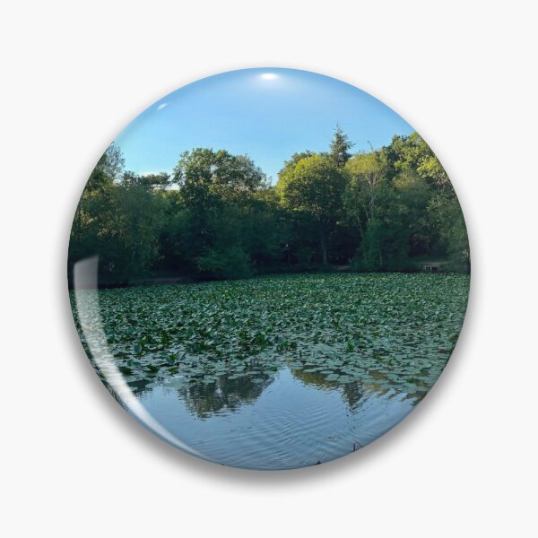 Item preview, Peaceful Lily Pond Surrounded by Woodland Under Blue Sky designed and sold by ThatSurreyLife.