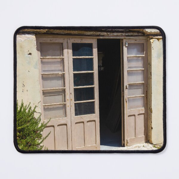 Item preview, Old Wooden Doors and Stone Building Rustic Mediterranean Entrance With Sunlit Weathered Facade designed and sold by Nmallia.