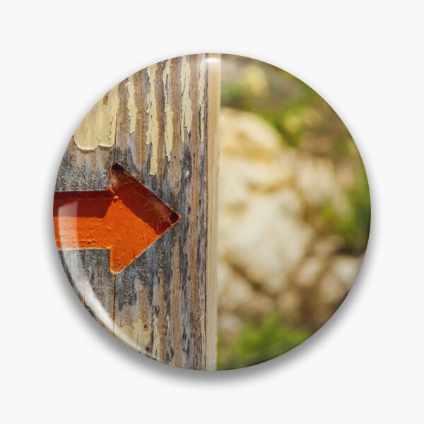 Item preview, Weathered Wooden Post With Orange Arrow Direction Sign Pointing Right On Outdoor Trail designed and sold by Nmallia.