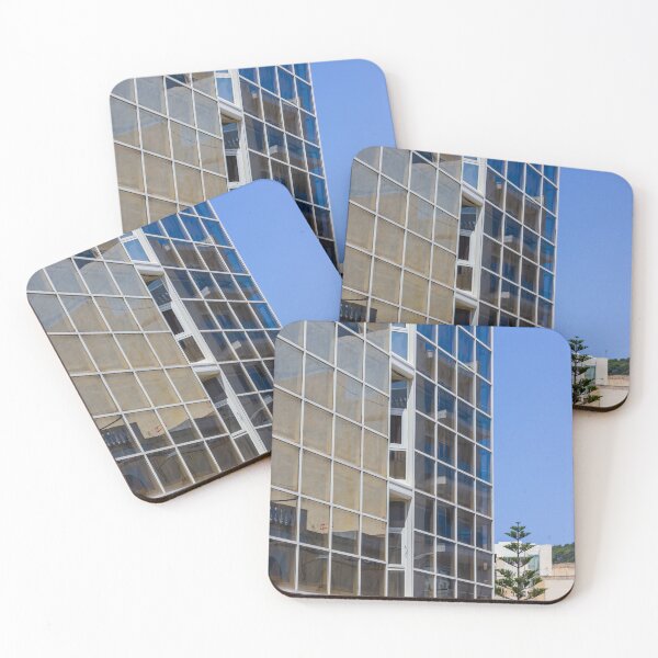 Item preview, Modern Glass Building Facade With Reflective Windows, Blue Sky and Urban Architectural Detail designed and sold by Nmallia.