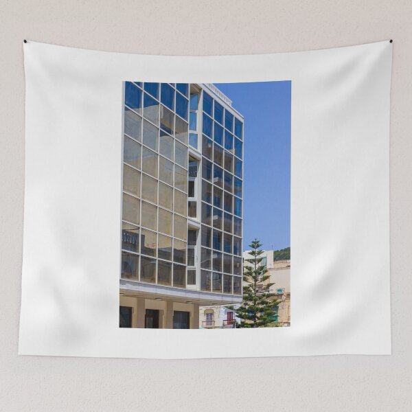 Item preview, Modern Glass Building Facade With Reflective Windows, Blue Sky and Urban Architectural Detail designed and sold by Nmallia.