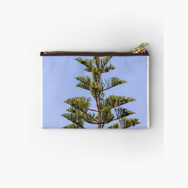 Item preview, Tall Pine Tree Top Against Clear Blue Sky With Layered Branches And Green Needles designed and sold by Nmallia.