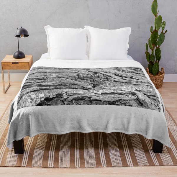 Item preview, Close-Up Black and White Tree Bark Texture With Rough Grooves And Knotted Weathered Wood designed and sold by Nmallia.