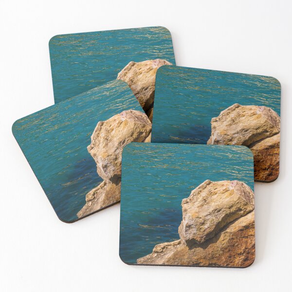 Item preview, Turquoise Sea Water and Sunlit Coastal Rocks on a Rocky Cliff by the Shoreline designed and sold by Nmallia.