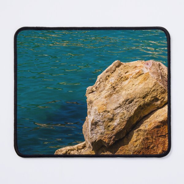 Item preview, Turquoise Sea Water and Sunlit Coastal Rocks on a Rocky Cliff by the Shoreline designed and sold by Nmallia.