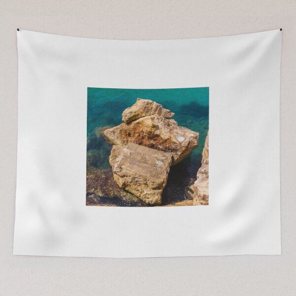 Item preview, Turquoise Sea Water and Sunlit Coastal Rocks on a Rocky Cliff by the Shoreline designed and sold by Nmallia.
