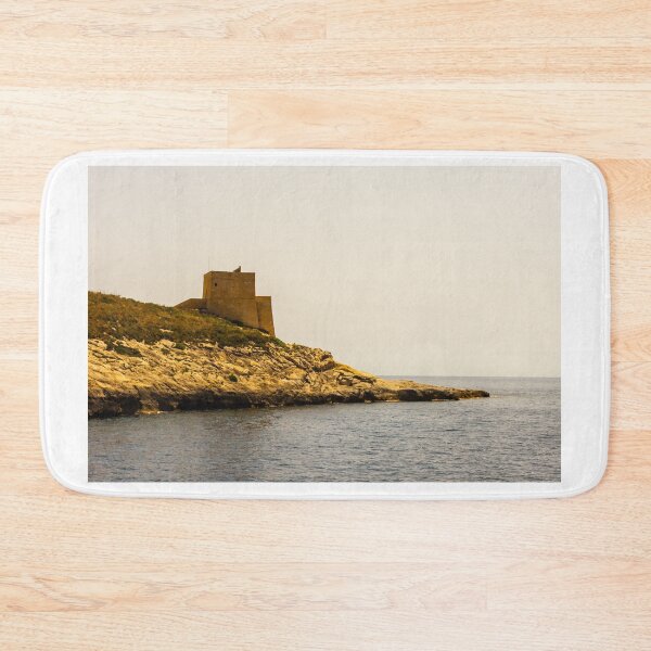 Item preview, Historic Coastal Watchtower On Rocky Cliff Overlooking Calm Mediterranean Sea On A Sunny Day designed and sold by Nmallia.