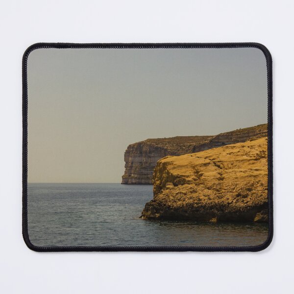Item preview, Golden Coastal Cliffs Over Calm Sea With Wide Horizon And Tranquil Summer Sky designed and sold by Nmallia.