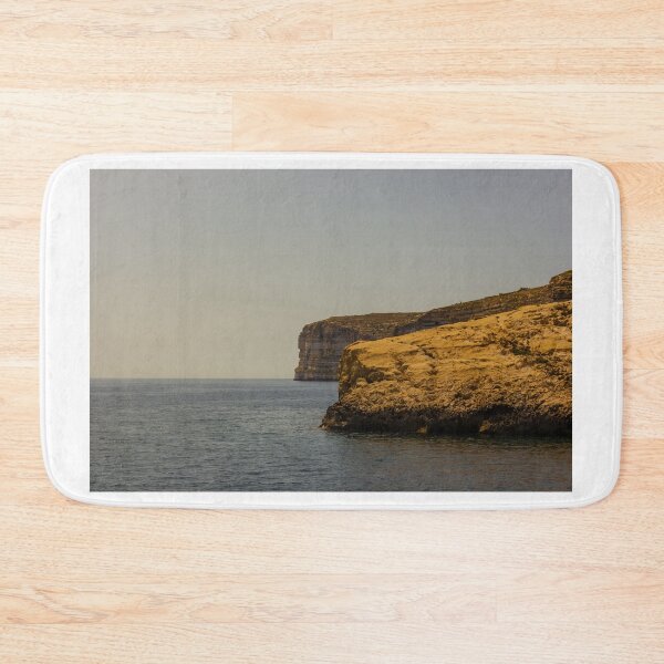 Item preview, Golden Coastal Cliffs Over Calm Sea With Wide Horizon And Tranquil Summer Sky designed and sold by Nmallia.