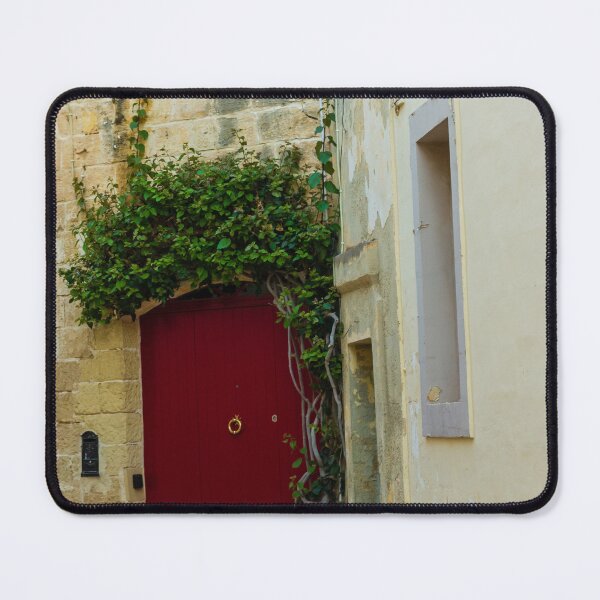 Item preview, Red Door in Narrow Stone Alley With Ivy Climbing an Old Mediterranean Building and Weathered Walls designed and sold by Nmallia.