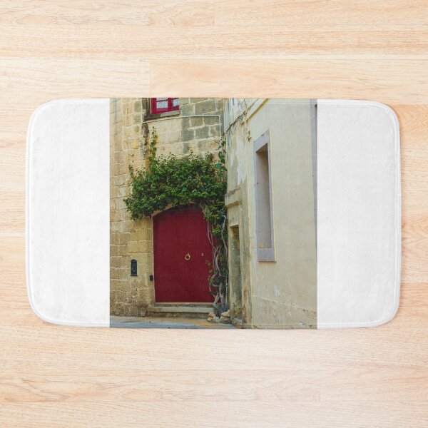 Item preview, Red Door in Narrow Stone Alley With Ivy Climbing an Old Mediterranean Building and Weathered Walls designed and sold by Nmallia.
